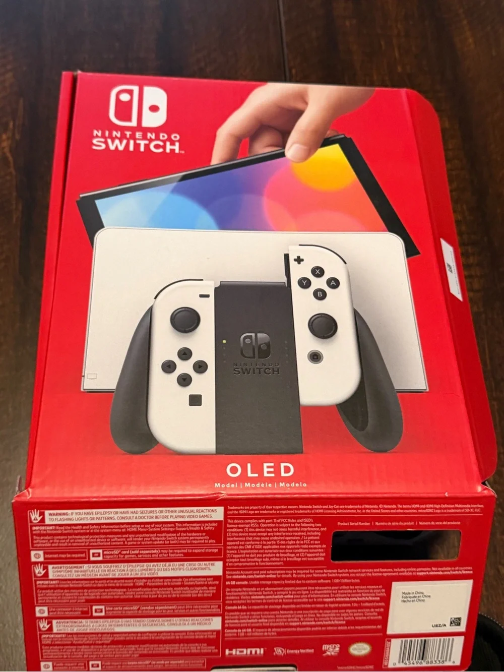 Nintendo Switch OLED Console Bundle in White with Black Case and Two Games